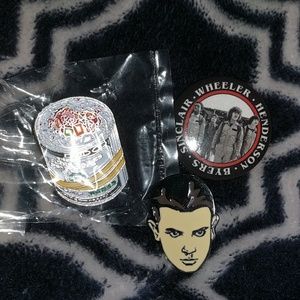 Pins and a Stranger Things button